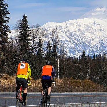 Cyclists in a clean mountain environment