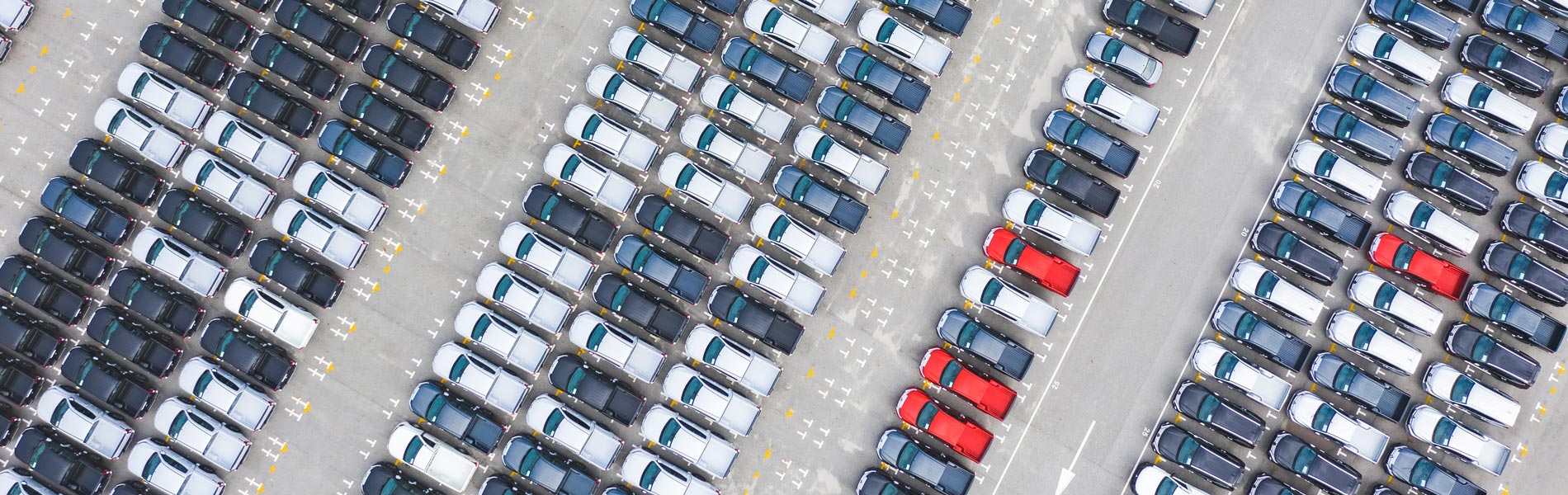 Cars parked in rows viewed from above