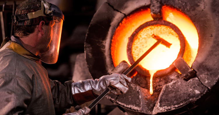 Man working in an industrial forge